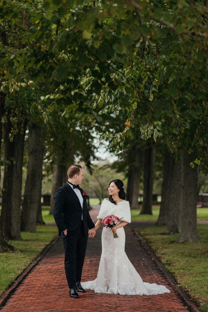 A portrait session of a bride and a groom at Bourne Mansion wedding