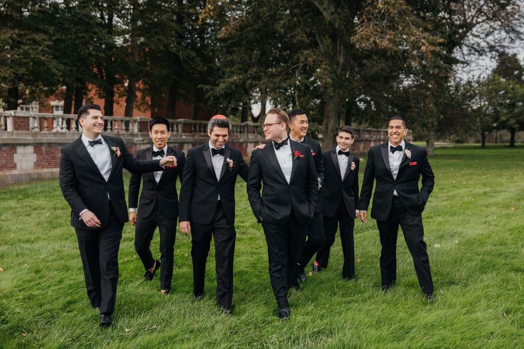 A grrom and his groomsmen posing for a picture at Bourne Mansion, Oakdale, NY