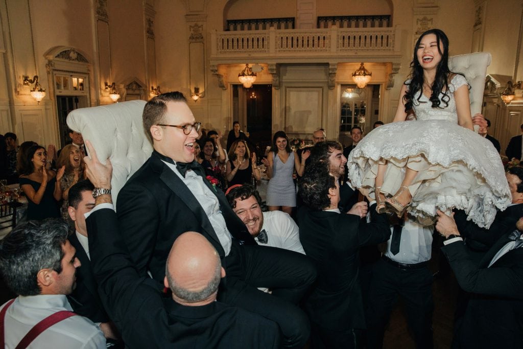 A horah during a wedding reception at Bourne Mansion in Long Island, NY