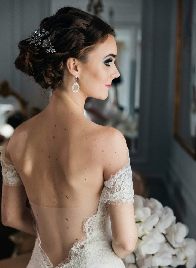 Bride posing for a portrait picture in a room at The St. Regis NYC in New York