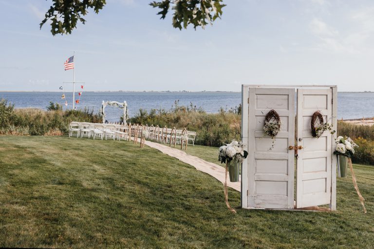 Rustic wedding ceremony setting near the water in the Hamptons